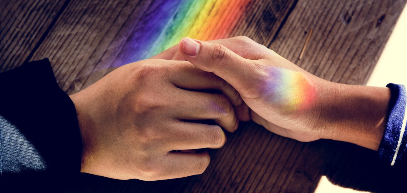 Hands Hold Together with Prism Lights